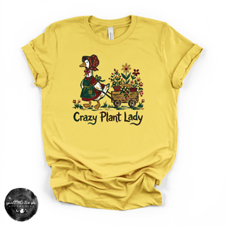 Yellow t-shirt with a graphic of a goose and flowers and the text 'Crazy Plant Lady' on a white background.