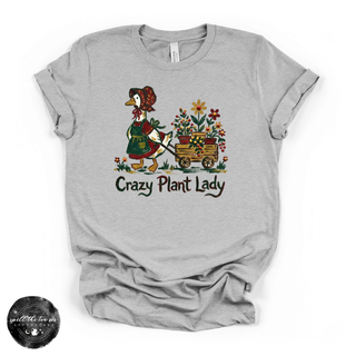 Gray t-shirt with a graphic of a goose and flowers and the text 'Crazy Plant Lady' on a white background.