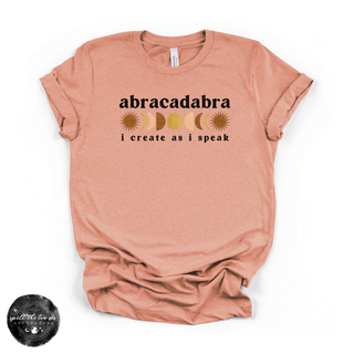 Abracadabra I create as I speak graphic tee sunset