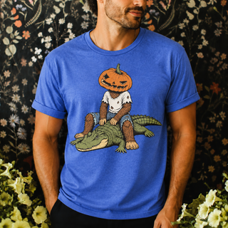 Pumpkin Head Bigfoot on a Crocodile Tee | Funny Cryptid Halloween Graphic T-Shirt