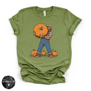 Bigfoot Carrying Pumpkin Tee | Funny Sasquatch Fall Graphic T-Shirt