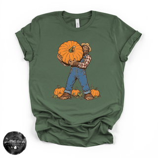 Bigfoot Carrying Pumpkin Tee | Funny Sasquatch Fall Graphic T-Shirt