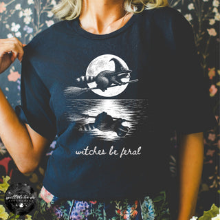 Witches Be Feral Raccoon Tee | Funny Witchy Halloween Graphic T-Shirt